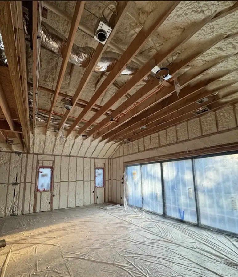 Interior walls and ceiling insulated with spray foam during new construction in Charlotte